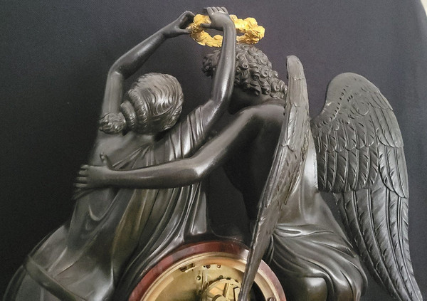 pendulum "the coronation of love" after the sculpture by Claude Michallon. Empire period