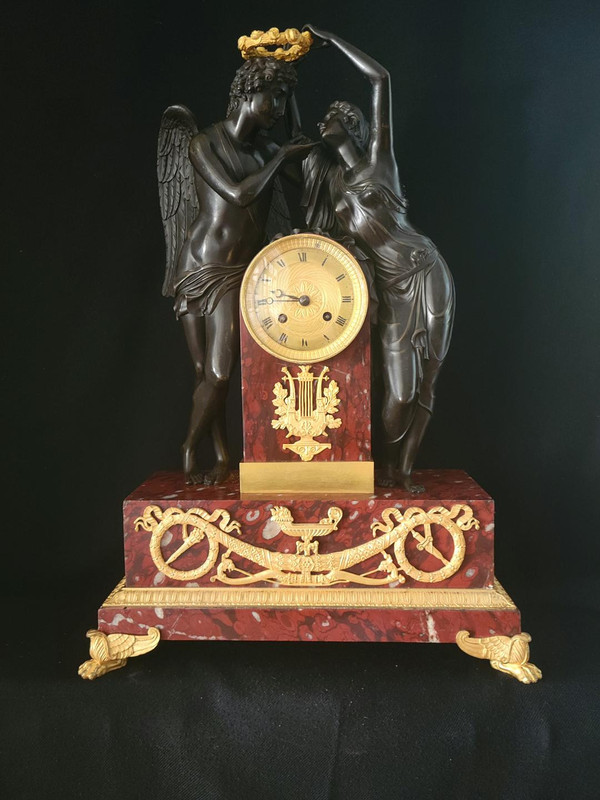 pendulum "the coronation of love" after the sculpture by Claude Michallon. Empire period
