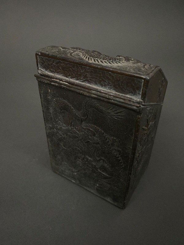 Asian tea caddy in 1900 metal with rich dragon ornamentation