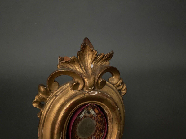 19th century Reliquary with gilded stucco frame