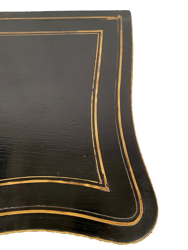 Console Napoléon III formant table à jeux, bois noirci et marqueterie de laiton