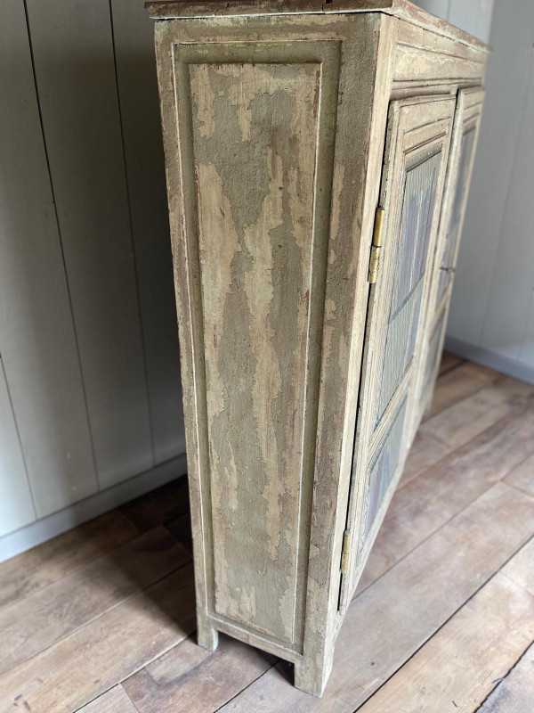 Bibliothèque en bois patine datant de la fin du 19 e siècle avec trompe l’oeil