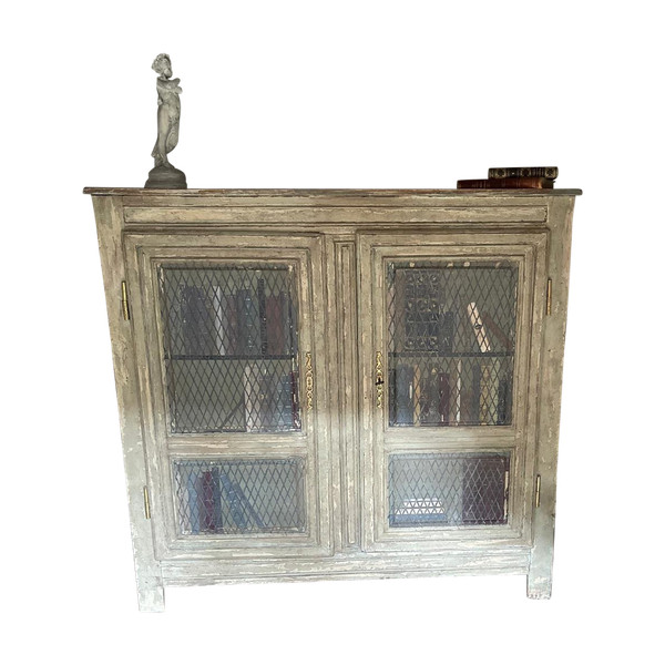 Bibliothèque en bois patine datant de la fin du 19 e siècle avec trompe l’oeil