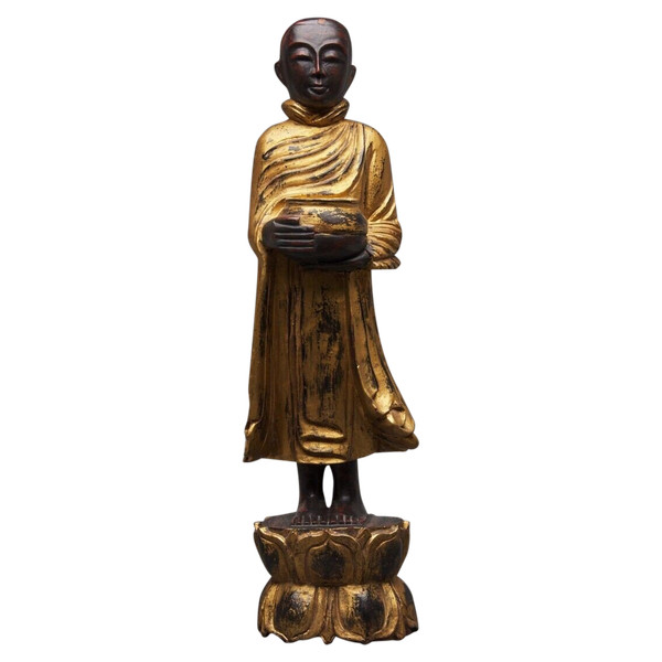 Soggetto di Buddha in legno intagliato e dorato in policromia, fine XIX secolo