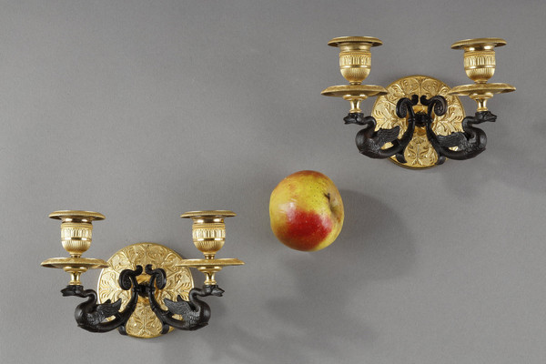 Small pair of two-light ormolu sconces with brown patina