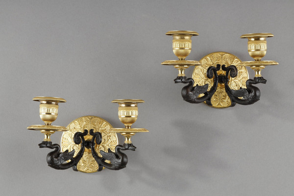 Small pair of two-light ormolu sconces with brown patina