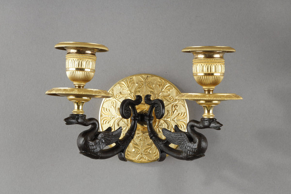 Small pair of two-light ormolu sconces with brown patina