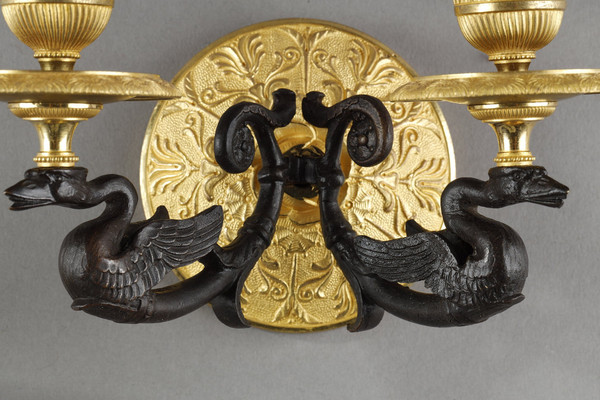Small pair of two-light ormolu sconces with brown patina
