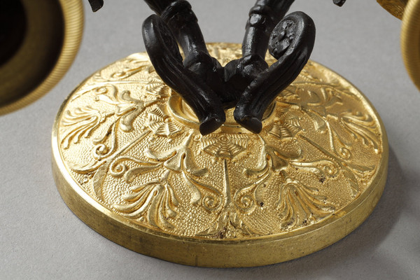 Small pair of two-light ormolu sconces with brown patina