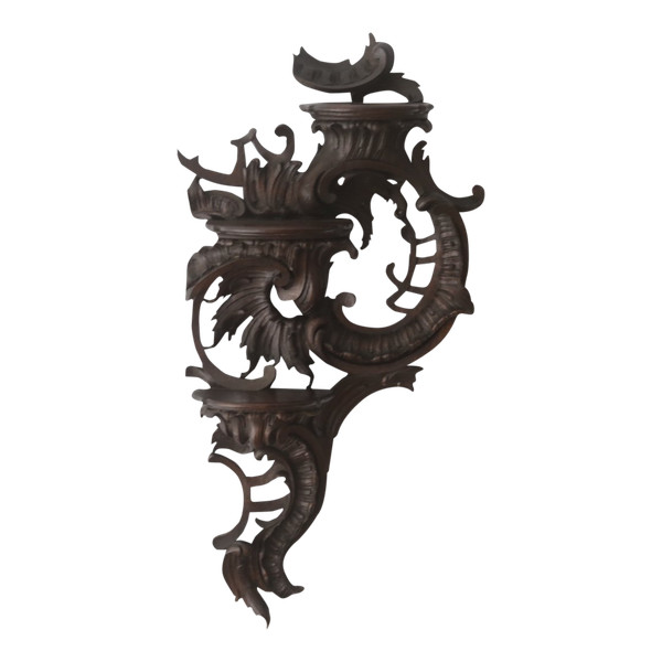  Carved oak wall lamp in the Louis XV rocaille style.