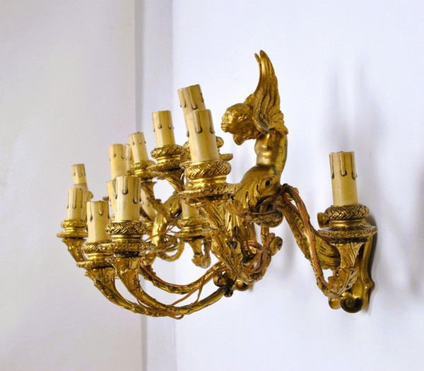 Coppia di appliques in bronzo dorato con putti alati, Napoleone III, XIX secolo