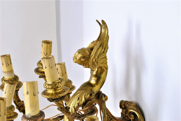 Coppia di appliques in bronzo dorato con putti alati, Napoleone III, XIX secolo