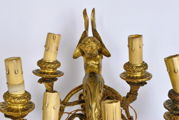 Coppia di appliques in bronzo dorato con putti alati, Napoleone III, XIX secolo