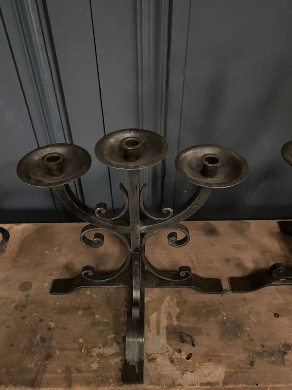 Pair of neo-gothic ironwork candlesticks with 3 lights, 1940