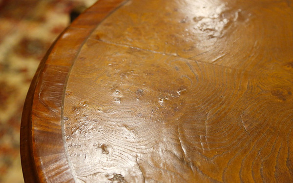 Oval table in marquetry and varnished wood 
