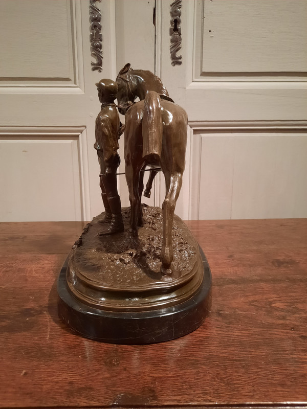 Bronze representing a jockey and his horse signed P.J. Mène 1866, 20th century.