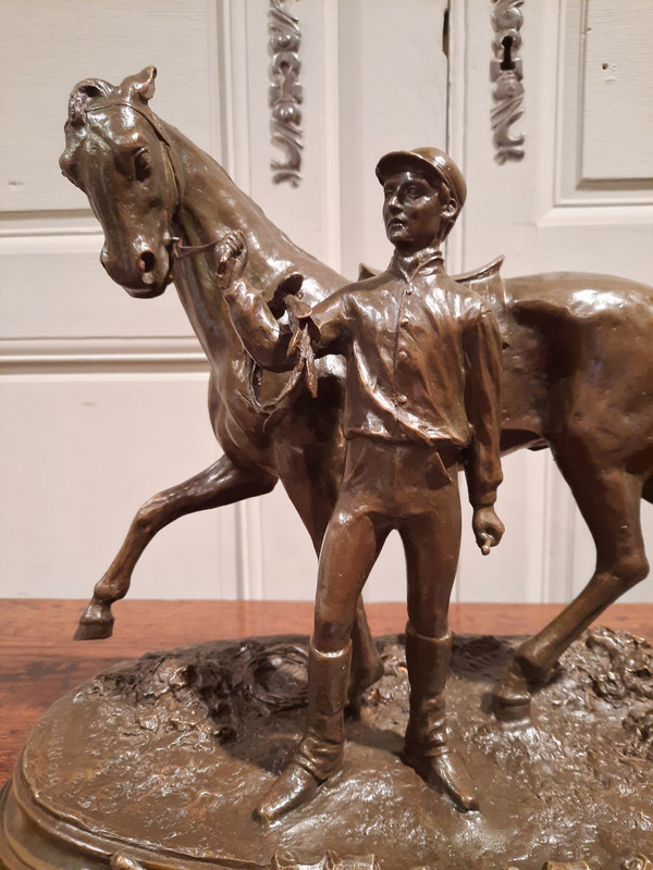 Bronze representing a jockey and his horse signed P.J. Mène 1866, 20th century.