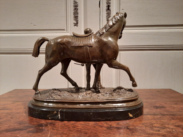 Bronze representing a jockey and his horse signed P.J. Mène 1866, 20th century.