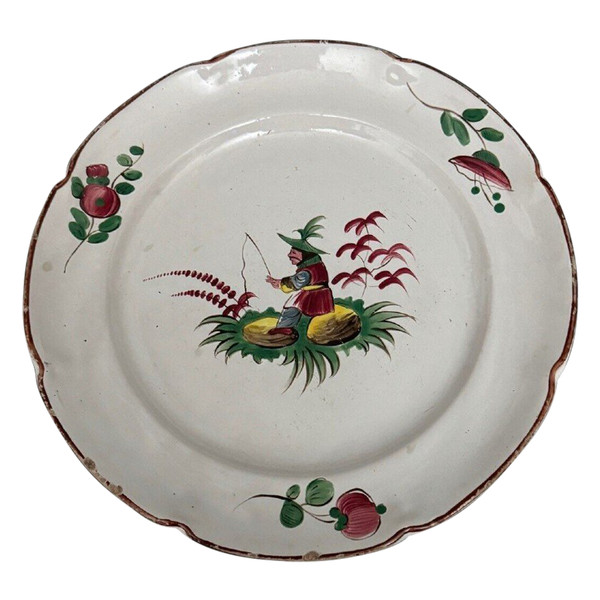 Plate in 18th century Islettes earthenware with Chinese décor