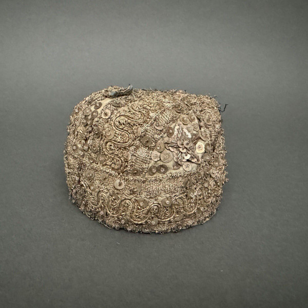 1930s child's headdress with embroidered pearls