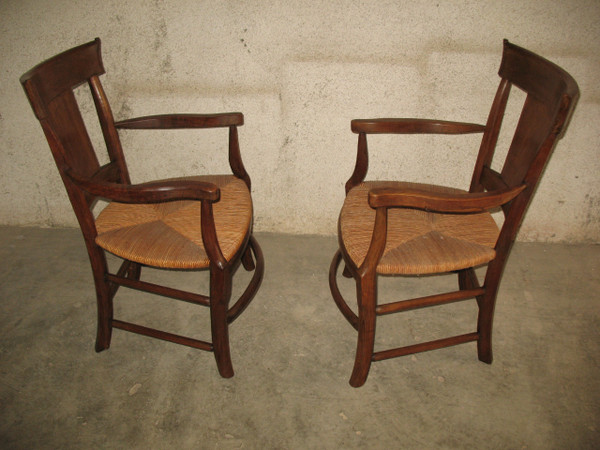 Pair of Restoration-period straw-covered armchairs in walnut Origin Périgord 19th century Directoire style