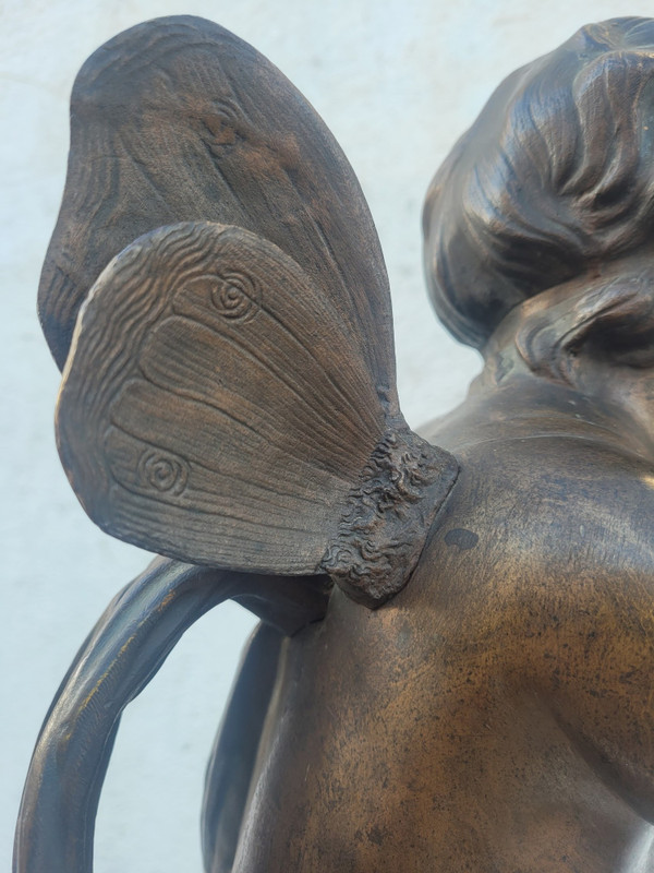 Bronzo di putto alato in piedi, fine XIX secolo inizio XX secolo