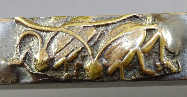 Japan, 1930s/1950s, Bronze inkwell with relief decoration of a figure and a dragon.