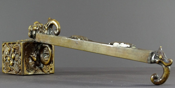Japan, 1930s/1950s, Bronze inkwell with relief decoration of a figure and a dragon.
