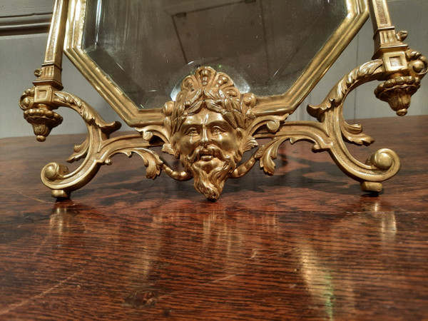 Miroir de salon en bronze de style Régence d’époque XIXème siècle.