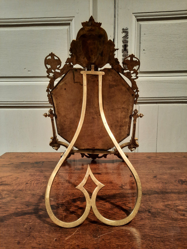 Miroir de salon en bronze de style Régence d’époque XIXème siècle.