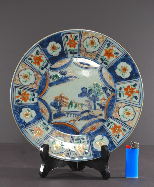 China 18th Century, Porcelain Dish Featuring Imari Decor of a Pagoda in a Garden.