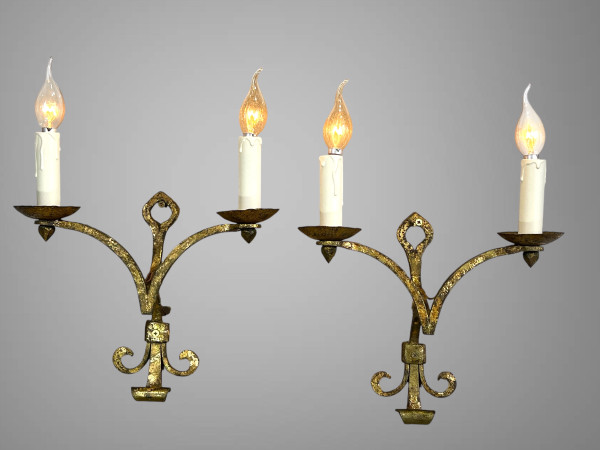 PAIR OF WALLLIGHTS BY ROBERT AND ROGER THIBIER 20th CENTURY IN GILDED AND MARTELLED IRON