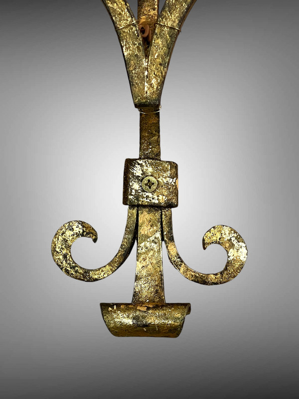 PAIR OF WALLLIGHTS BY ROBERT AND ROGER THIBIER 20th CENTURY IN GILDED AND MARTELLED IRON