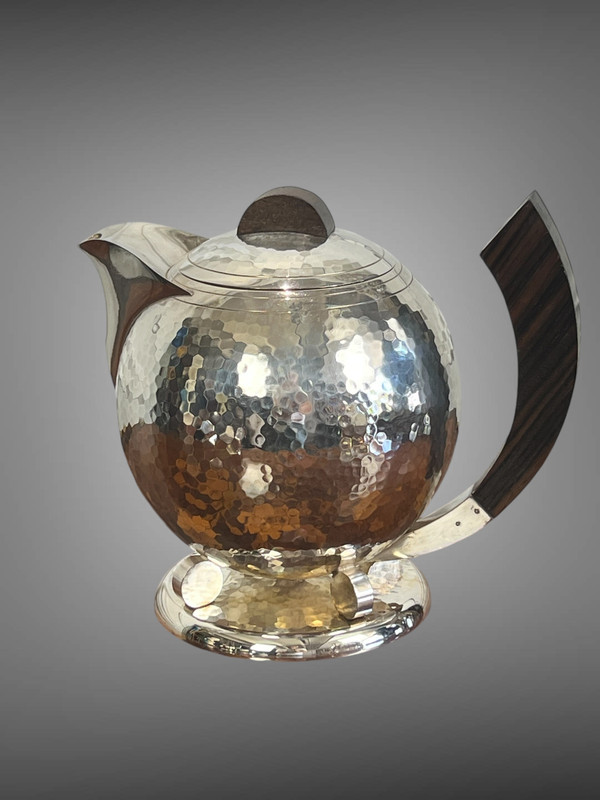 JEAN DEPRÉS ( 1889-1980 ) / HAMMERED SILVER-PLATED TEA AND COFFEE SET