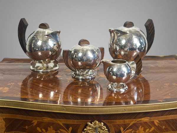 JEAN DEPRÉS ( 1889-1980 ) / HAMMERED SILVER-PLATED TEA AND COFFEE SET