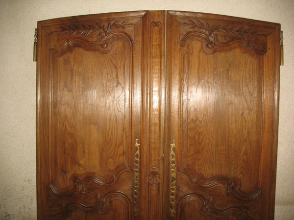 Pair of Louis XV style woodwork doors in carved oak, early 19th century