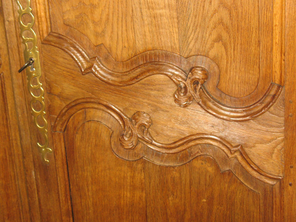 Pair of Louis XV style woodwork doors in carved oak, early 19th century