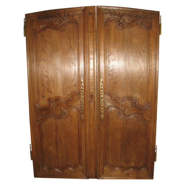 Pair of Louis XV style woodwork doors in carved oak, early 19th century