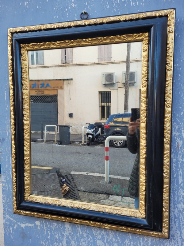 Specchio in legno annerito e dorato, XVII secolo