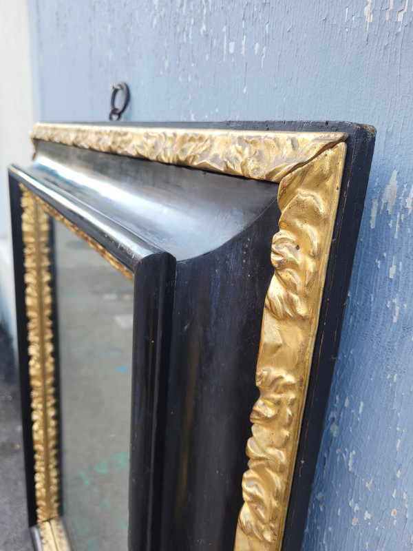 Specchio in legno annerito e dorato, XVII secolo