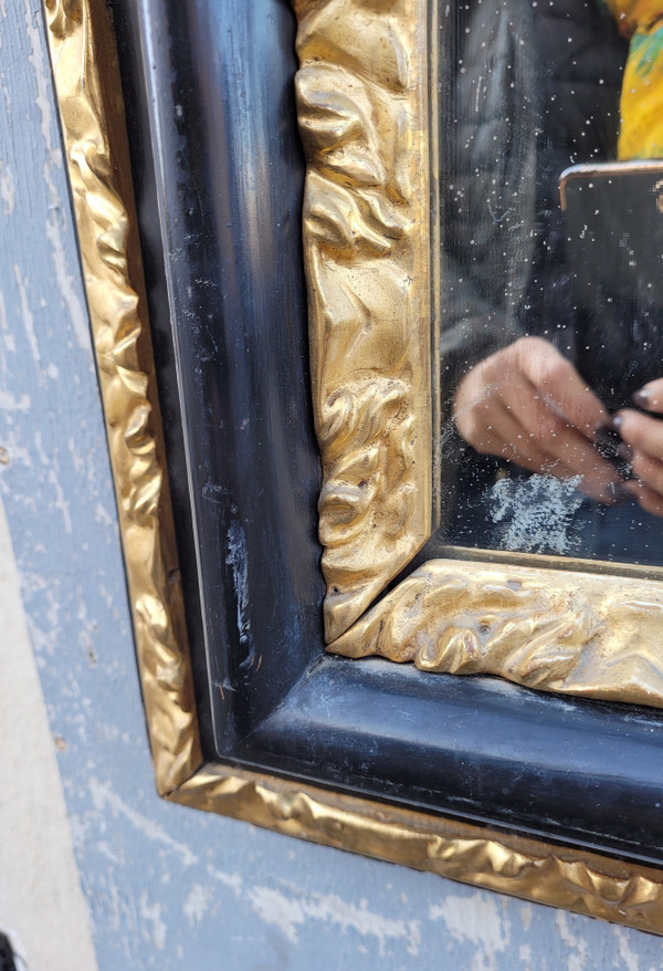 Specchio in legno annerito e dorato, XVII secolo