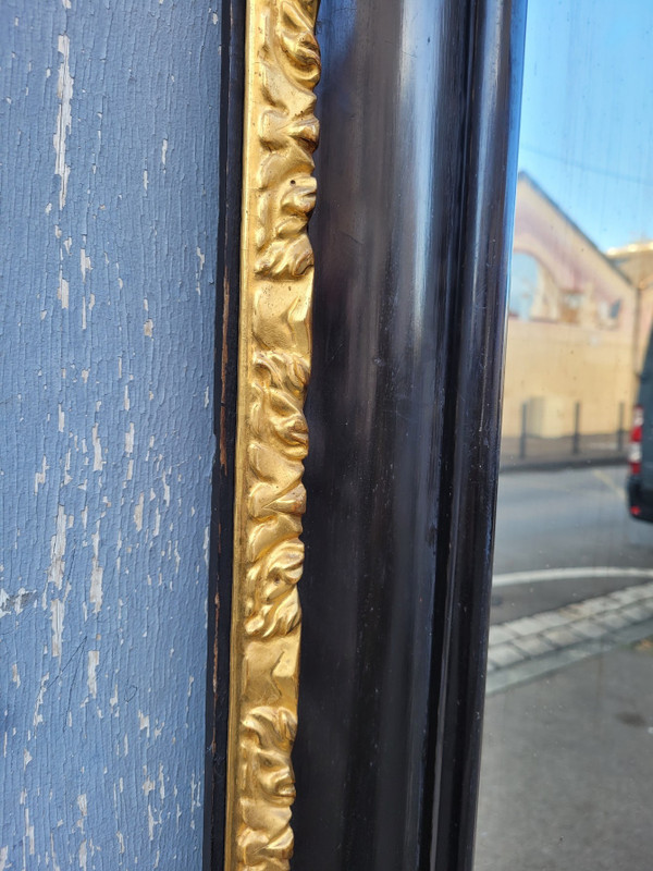 Specchio in legno annerito e dorato, XVII secolo