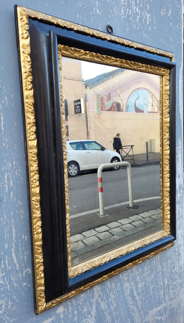 Specchio in legno annerito e dorato, XVII secolo