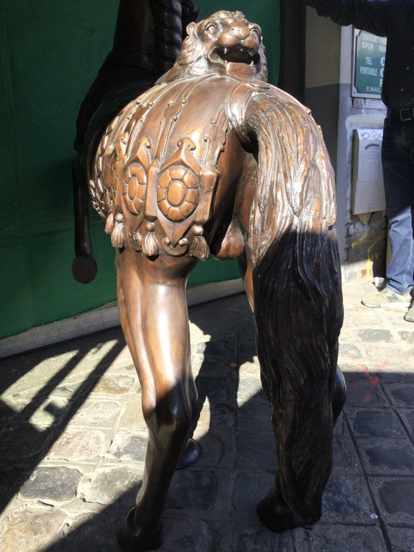 Bronze statue of a merry-go-round horse with brown patina 20th century