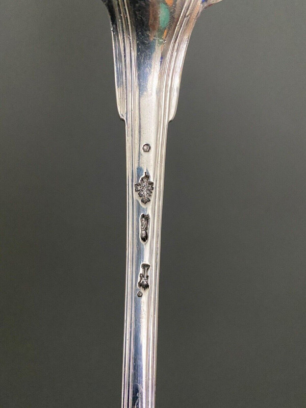 Solid silver stew spoon, 18th century shell model with coat of arms