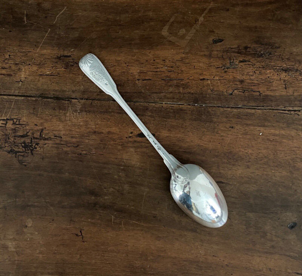 Solid silver stew spoon, 18th century shell model with coat of arms