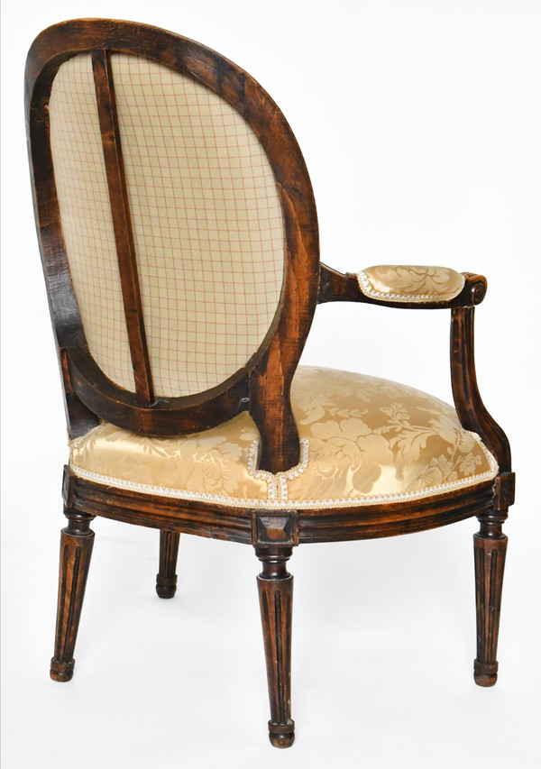 Pair of Louis XVI period cabriolet armchairs