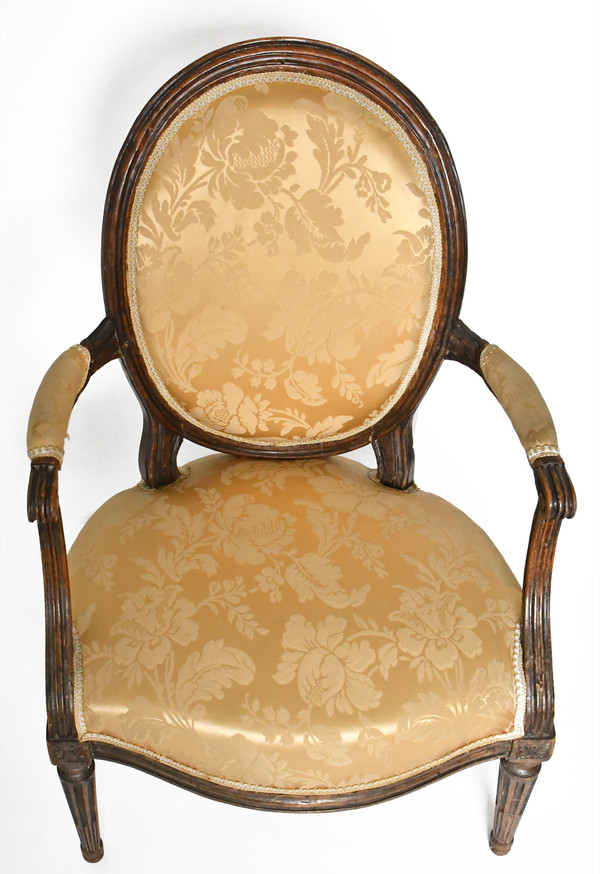 Pair of Louis XVI period cabriolet armchairs