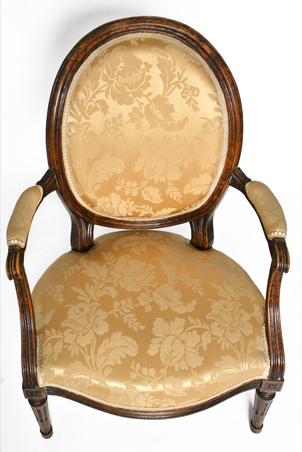 Pair of Louis XVI period cabriolet armchairs