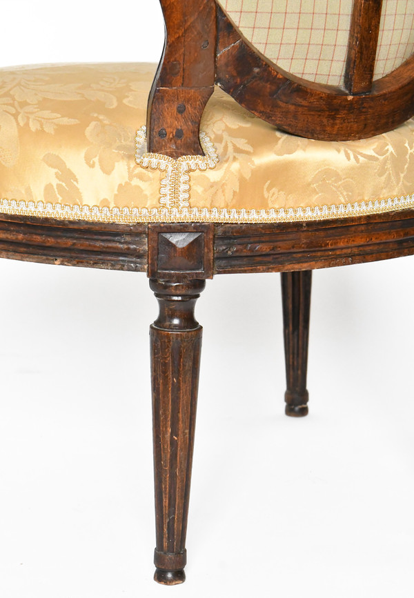Pair of Louis XVI period cabriolet armchairs